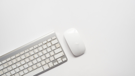 Office desk table with  keyboard, Top viewの写真素材