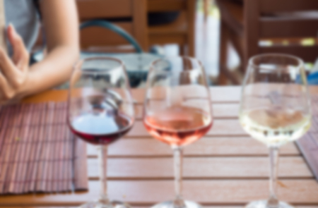 blur wine grape on wood tableの写真素材