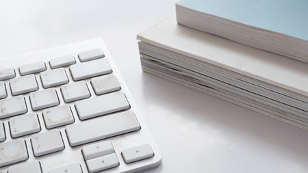 keyboard close up with bookの写真素材