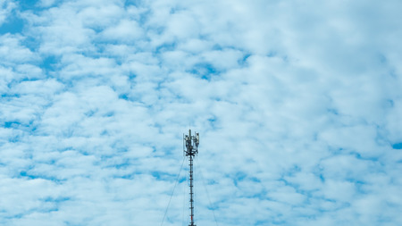 Telecommunications equipment - directional mobile phone antenna dishes. Wireless communication and blue skyの写真素材