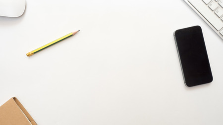 notebook with keyboard and pencil on white background business conceptの写真素材