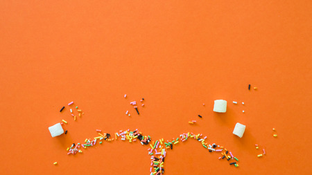 Spray with colored Rainbow and marshmallow Sprinkles creative concept.の写真素材