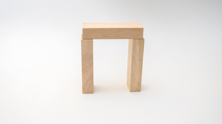 wooden block concept house on white background
