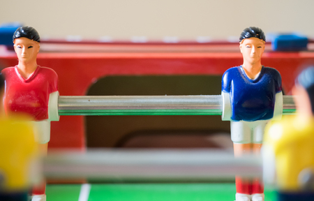 football table soccer players selective focus blue and red playerの写真素材