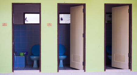 Public toilet color green concreteの写真素材