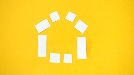 home paper cut yellow backgroundの写真素材