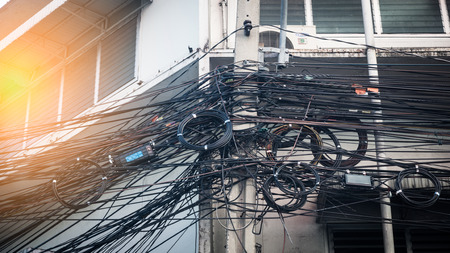 Messy electrical cables in thailand - Tangled electrical wires and cables
