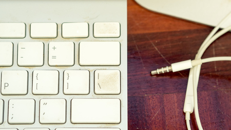 keyboard  and earphone close up topviewの写真素材