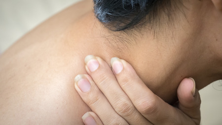 Young  man Neck painの写真素材