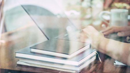 Young man sitting in a office working for successの写真素材