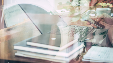 Young man sitting in a office working for successの写真素材
