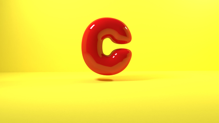 3d render red bubble plastic on yellow background letters cの写真素材