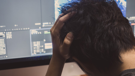 Serious business man working at office with computer business  concept.の写真素材