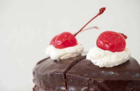close up cherry on cake chocolate bakeryの写真素材