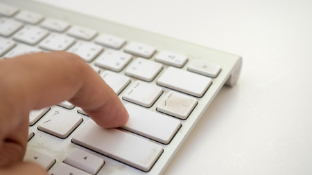 Office desk table keyboard,and hand Top viewの写真素材