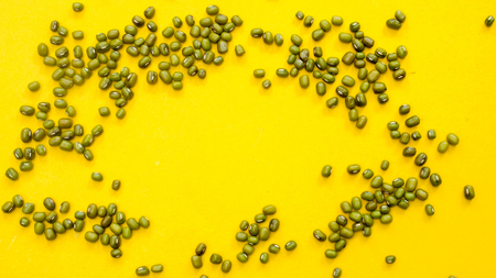 Mung bean copy space on yellow backgroundの写真素材
