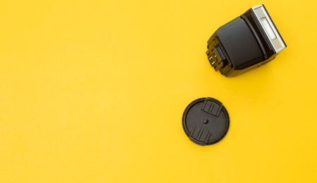 flash camera on yellow backgroundの写真素材