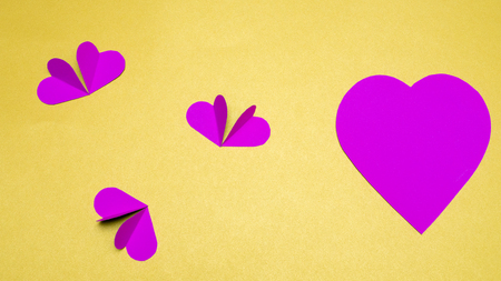 heart paper on yellow backgroundの写真素材