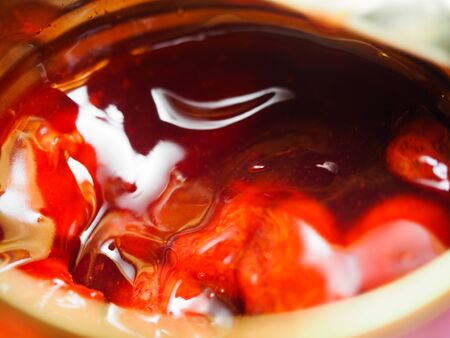 homemade strawberry jam in a glass close upの写真素材