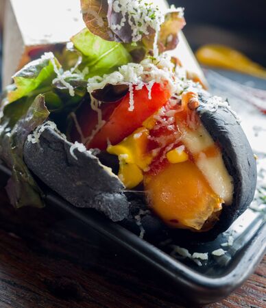 Bread with eggs and cheese and vegetablesの写真素材