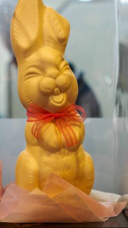 A cute yellow rabbit statueの写真素材