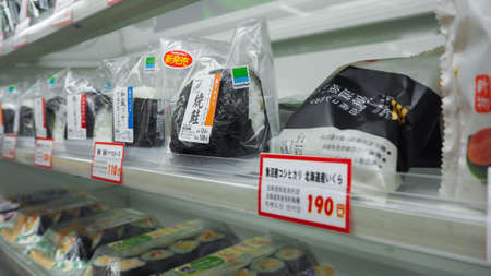 DOTONBORI, Onigiri, JAPAN-NOV 30, 2019 : Various flavors of Japanese rice onigiri sold at Family...