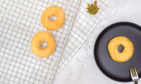 Homemade fried donuts with sugar and served.Top viewの写真素材