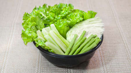 All kinds of fresh vegetables on a plateの写真素材