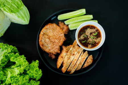 Marinated beef with garlic sauce arranged thai food top viewの写真素材