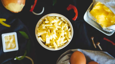 Cheese for cooking on black background