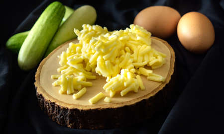 cheese mozzarella on black backgroundの写真素材