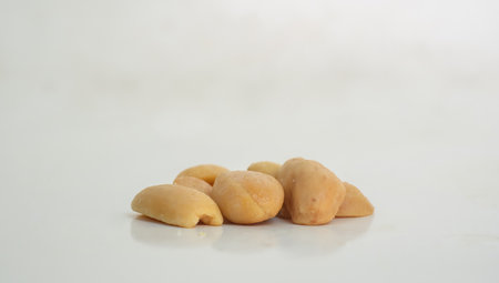 Salted Peanuts on White backgroundの写真素材