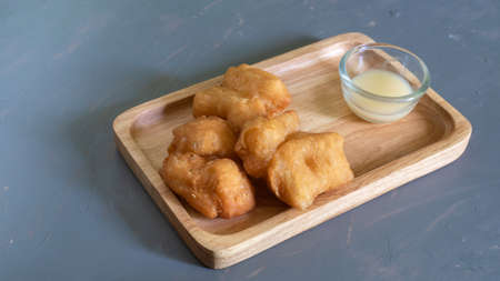 deep-fried dough stick on grey backgroundの写真素材