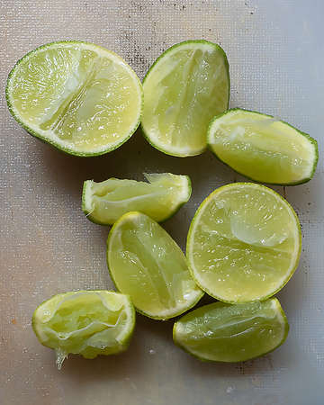 Prepare squeezed lemons for cooking.Vertical photo.の写真素材