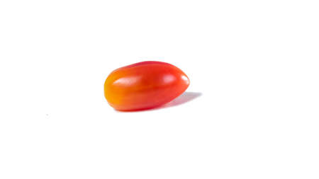 Miniature tomatoes isolated on white backgroundの写真素材