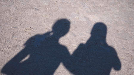 Shadows of man and woman  on the sea beach in sunny weather
Keywords:の写真素材