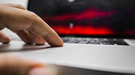 Keyboard,and hand with keyboard computer close upの写真素材