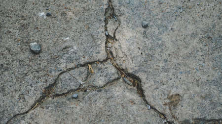 cracks on concrete background floorの写真素材