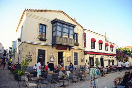 ALACATI, TURKEY - JULY, 11, 2021: Colorful Alacati Houses view in historical Alacati Town. Alacati is popular tourist destination in Turkey.のeditorial素材