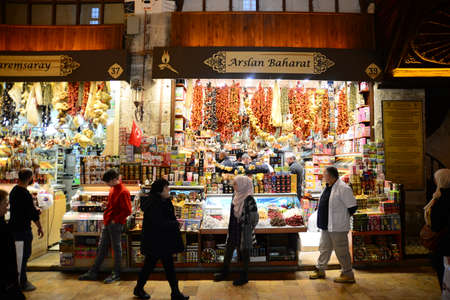 ISTANBUL, TURKEY, MARCH 14, 2019: People walking and shopping inside the Spice Bazaar (Egyptian...
