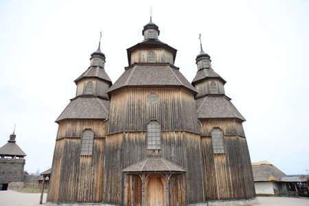 ZAPORIZHIA, UKRAINE - MARCH 24, 2019: Wooden church interior. Wooden building on Zaporozhye Sich in Ukraine. Medieval church on island of Khortitsa in Zaporozhye.のeditorial素材
