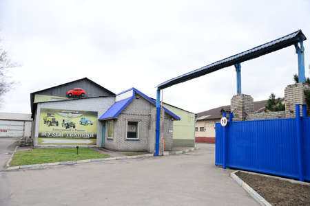 ZAPORIZHIA, UKRAINE - MARCH 24, 2019: The enterance of faeton museum of old retro vintage technology, cars and vehicles with cars, toys, bicycles and posters.のeditorial素材