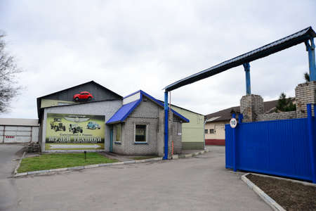 ZAPORIZHIA, UKRAINE - MARCH 24, 2019: The enterance of faeton museum of old retro vintage technology, cars and vehicles with cars, toys, bicycles and posters.のeditorial素材