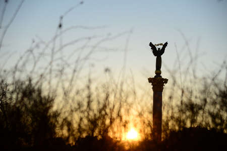 Ukraine, Kiev - APRIL 5, 2019: Independence Square (Maidan Nezalezhnosti) - the main square of Kiev, the Independence Column (Berehynia), the Conservatory and Khreshchatyk Street.のeditorial素材