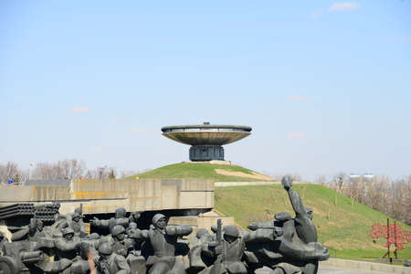 KYIV, UKRAINE - APRIL 10, 2019: The concrete and bronze monument of soldiers of World War 2 near Mother Motherland Monument in Kiev. historical sights of Ukraineのeditorial素材