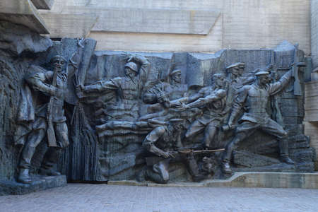 KYIV, UKRAINE - APRIL 10, 2019: The concrete and bronze monument of soldiers of World War 2 near Mother Motherland Monument in Kiev. historical sights of Ukraineのeditorial素材