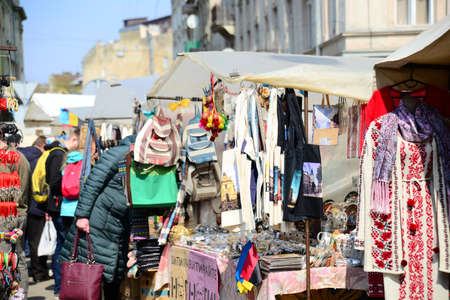 LVIV, UKRAINE - APRIL 17, 2019: Old flea and gift street market in the city of Lviv, Ukraine....