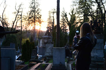 LVIV, UKRAINE - APRIL 17, 2019: Unique graves and sculptures on cemetery (famous and historic)called...