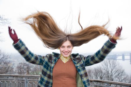 Pretty girl with great fly-away long hairの写真素材
