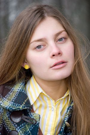 YOUNG BEAUTIFUL AND ATTRACTIVE WOMAN LOOKING AT CAMERAの写真素材